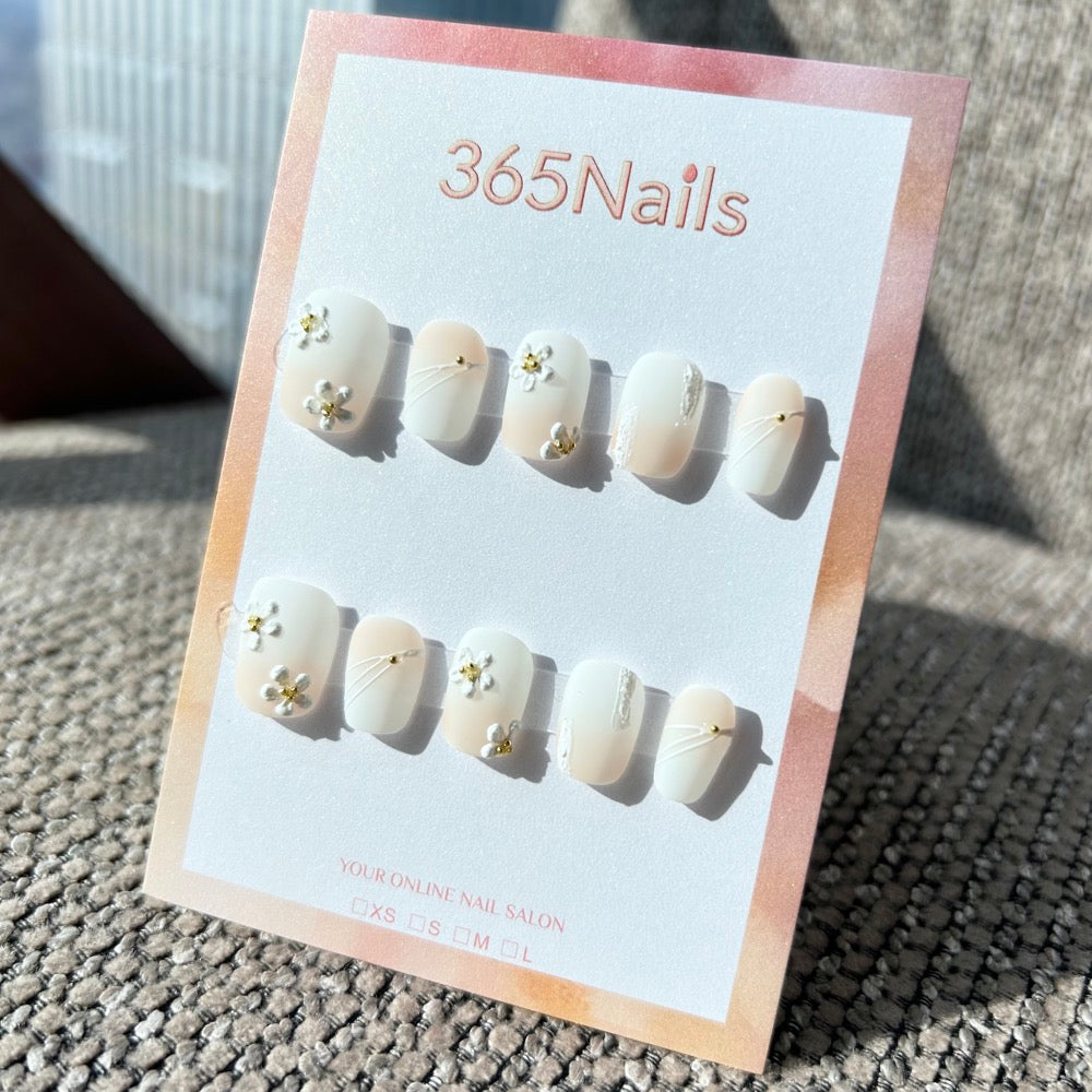Sweet & Dopamine: "Oat Milk Daisy" – Nude & White Ombre, 3D White Flower, Silver Wire & Gold Studs Short Square Press-on Nails