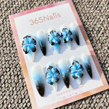 Sculpted Flora: "Ink Blue Lotus & Icy Dew" – 3D Blue & Black Flowers on Ombre Stiletto Nails with Dewdrops