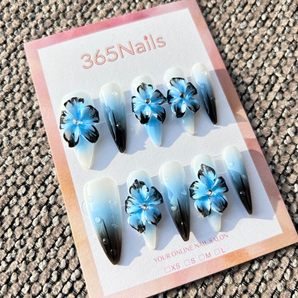 Sculpted Flora: "Ink Blue Lotus & Icy Dew" – 3D Blue & Black Flowers on Ombre Stiletto Nails with Dewdrops