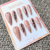 Femme Fatale: "Gothic Script" – Nude Pink Base with Black Old English Text & Silver Studs Long Stiletto Nails
