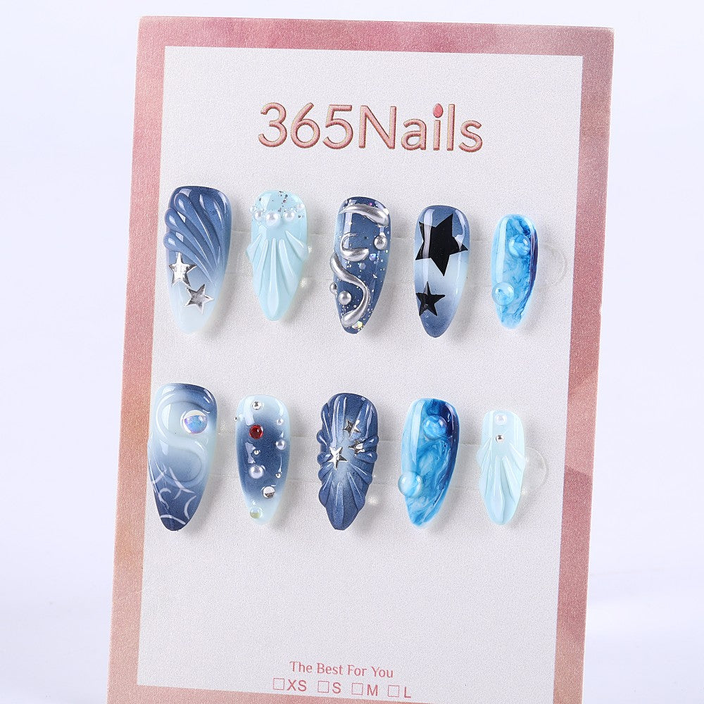Galaxy Blue Press-On Nails with Star Accents and 3D Cosmic Design