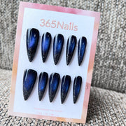 Cosmic Fatale: "Midnight Galaxy Glow" – Long Sharp Stiletto Handmade Press On Nails