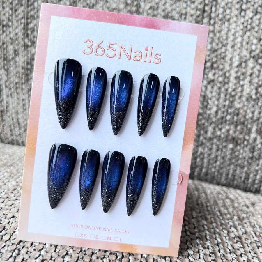 Cosmic Fatale: "Midnight Galaxy Glow" – Long Sharp Stiletto Handmade Press On Nails