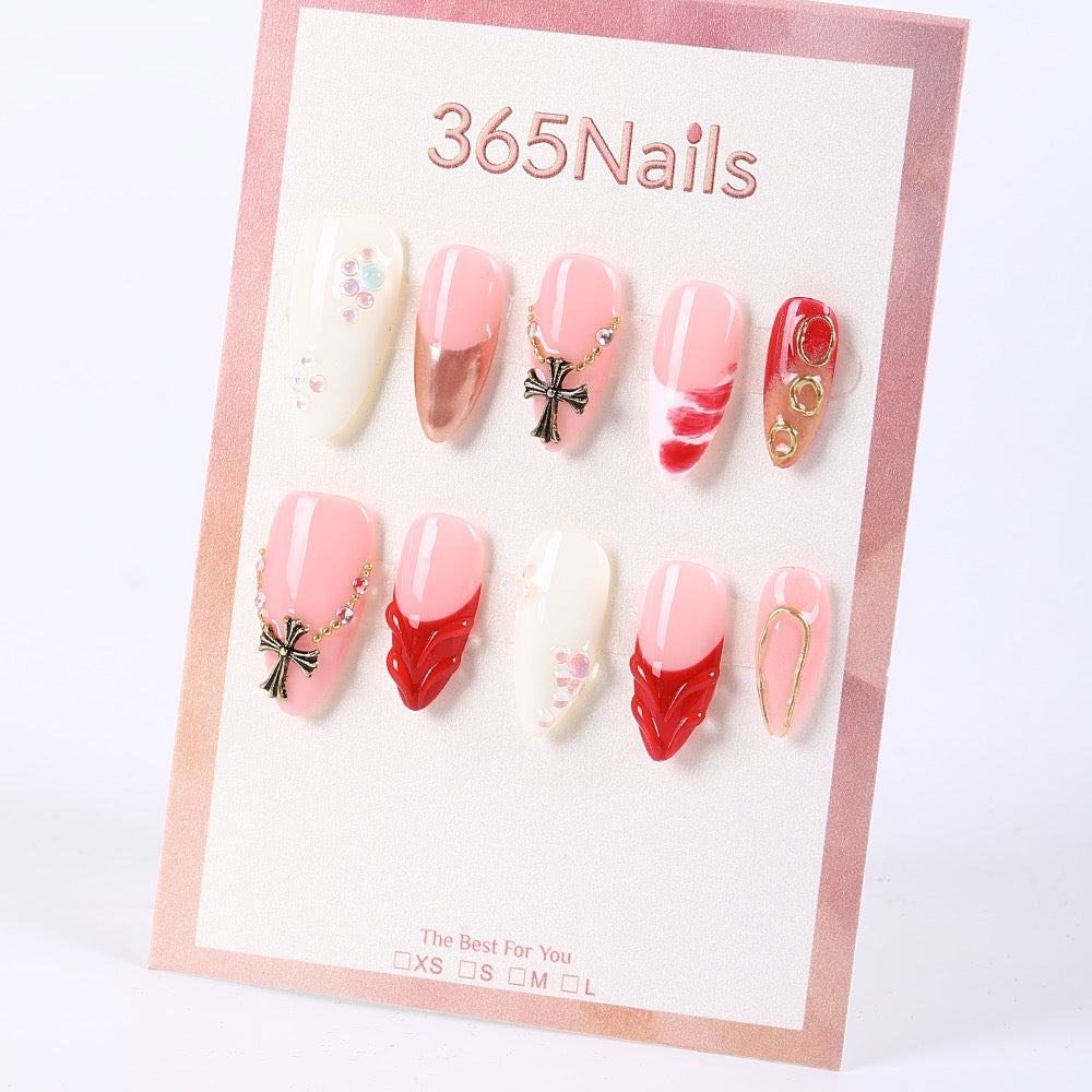 365Nails Creamy Pink Mix with Cross Bow Chains & Jelly Sculpt Press-OnsSold in packs of 5. Minimum order: 1 pack (5 pcs). Quantity = number of packs. Qty 1 = 5 pcs