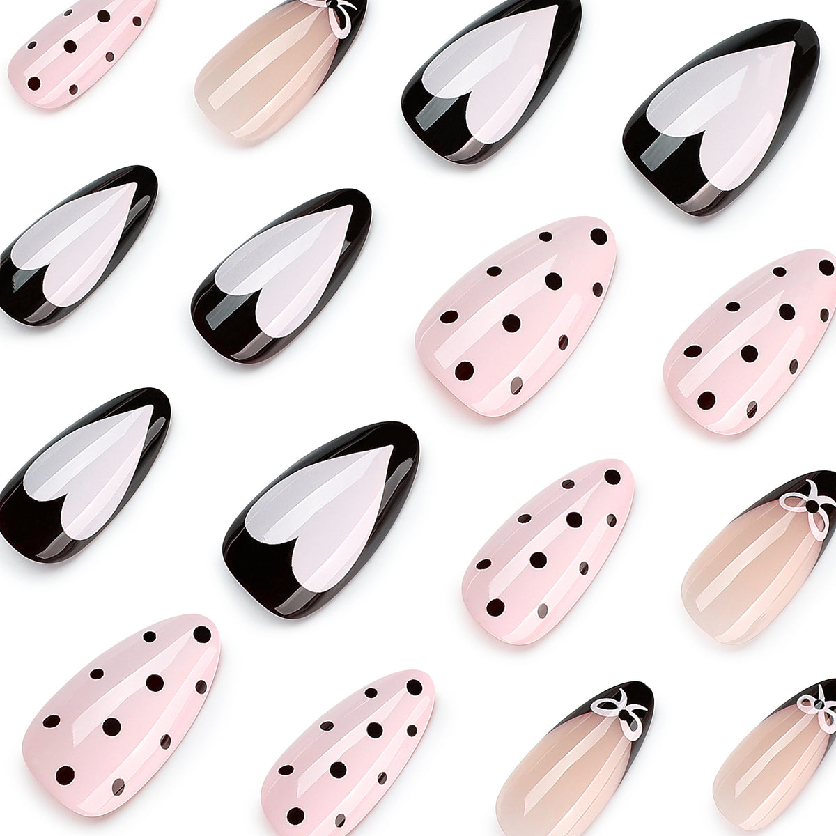 Close-up of glossy press-on nails in black, pink, and nude designs.