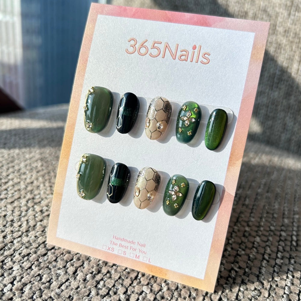 The Gilded Serpent: "Emerald Mamba" – Deep Green Cat Eye & Champagne Honeycomb Handmade Press-On Nails with Crystal Starburst