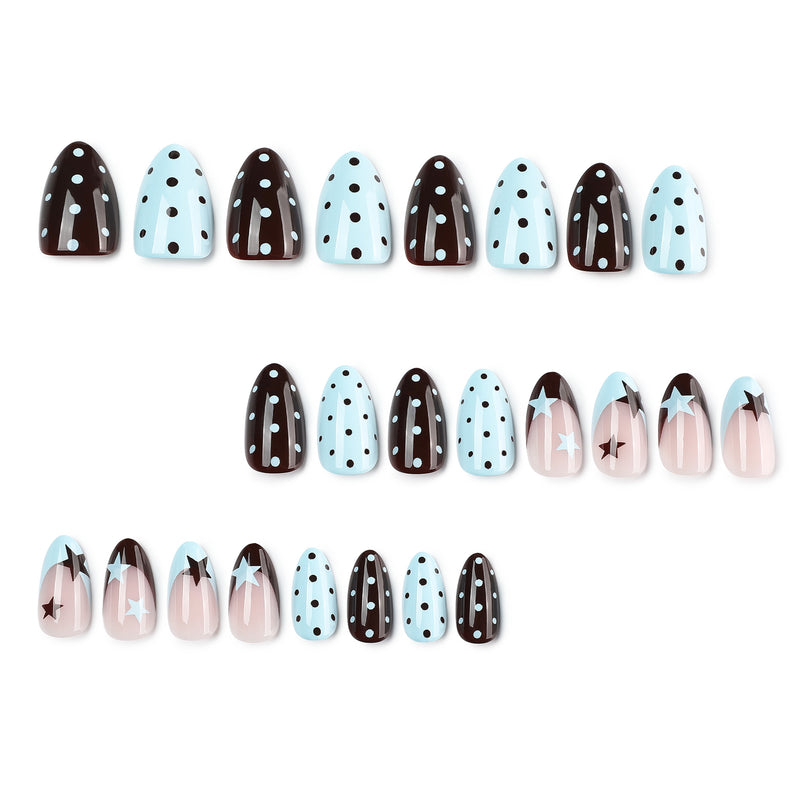Product display of brown, light blue and nude press-on nails with polka dots and stars