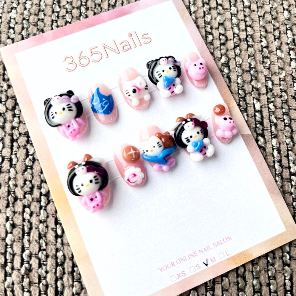 365nails: "Kitty's Blue Bow" – 3D Hello Kitty Short Almond Nails