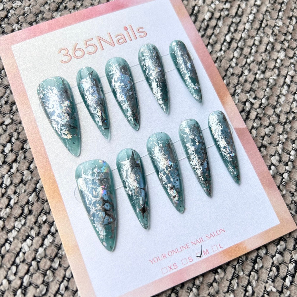 Femme Fatale: "Shattered Jade" – Dusty Sage Green Jelly Base with Crushed Silver Foil & Distressed Texture Long Stiletto Nails