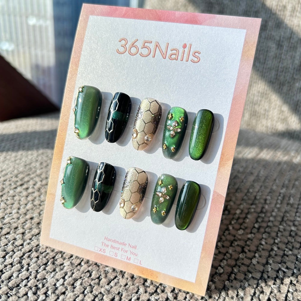The Gilded Serpent: "Emerald Mamba" – Deep Green Cat Eye & Champagne Honeycomb Handmade Press-On Nails with Crystal Starburst