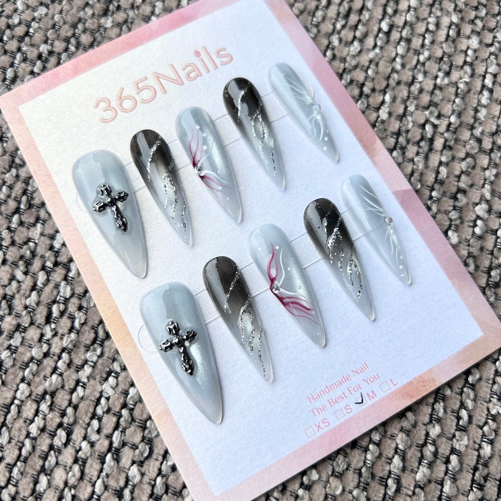 Femme Fatale: "Frozen Stigmata" – Icy Blue Cat Eye with Silver Cross Charm, Black Smudge & Crimson Thorn Art Long Stiletto Nails