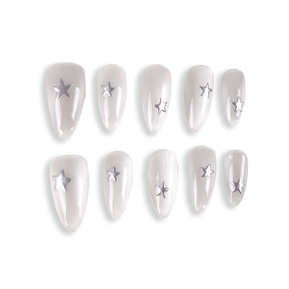 365Nails Moonlight Grey Almond with Silver StarsSold in packs of 5. Minimum order: 1 pack (5 pcs). Quantity = number of packs. Qty 1 = 5 pcs