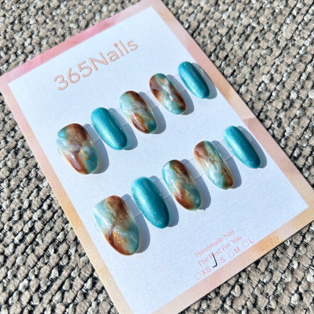 Ethereal Ink: "Cyan Landscape" – Teal Blue Cat Eye & Amber Brown Marble with Gold Foil Oval Nails