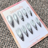 Femme Fatale: "Moonlight Armor" – Icy Blue Cat Eye Base with 3D Liquid Silver Chrome Tips & Rhinestones Long Stiletto Nails