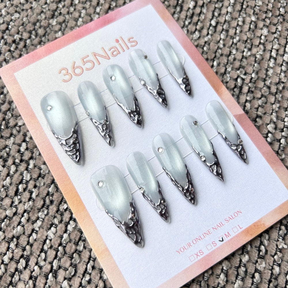 Femme Fatale: "Moonlight Armor" – Icy Blue Cat Eye Base with 3D Liquid Silver Chrome Tips & Rhinestones Long Stiletto Nails