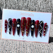 365nails : « Dynastie cramoisie » — ongles longs forme stiletto faits main avec rose 3D et feuille d'or