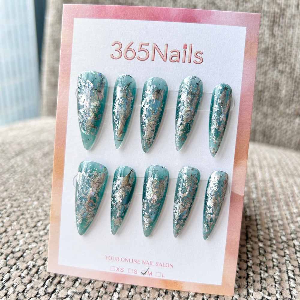 Femme Fatale: "Shattered Jade" – Dusty Sage Green Jelly Base with Crushed Silver Foil & Distressed Texture Long Stiletto Nails