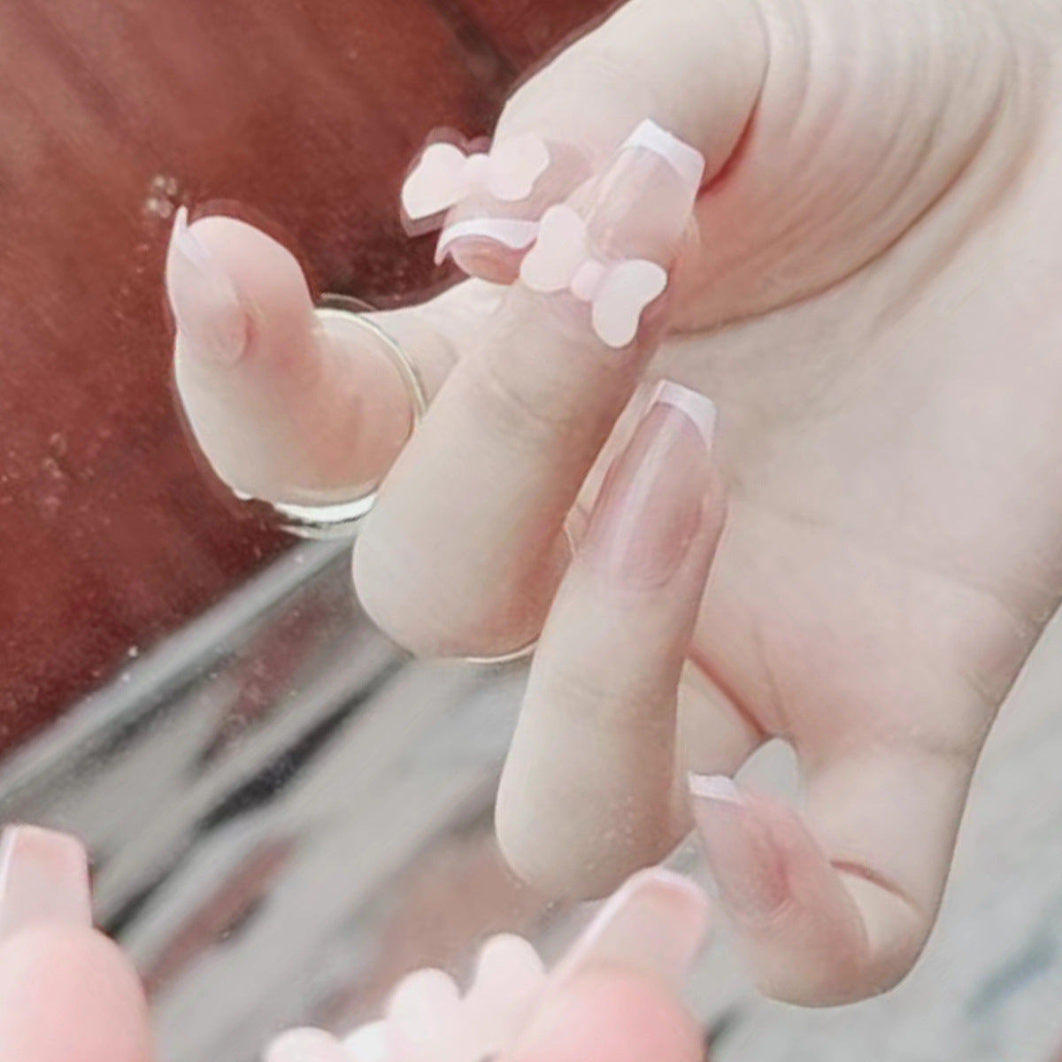 Sweet Nude French Tip Press-On Nails with 3D Pink Bows