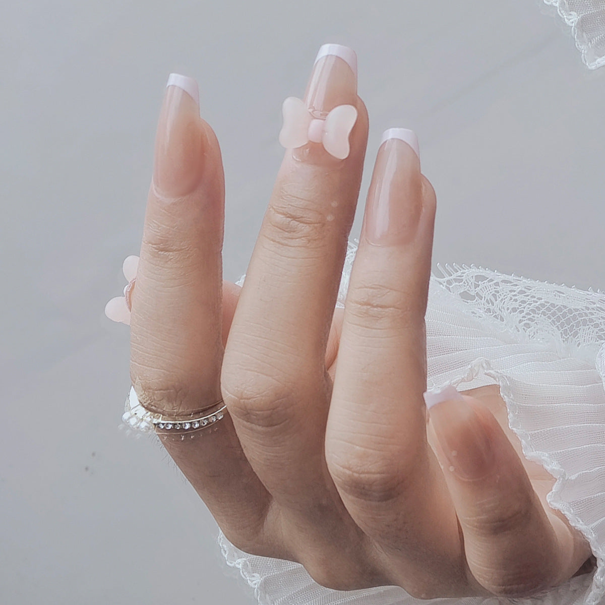 Sweet Nude French Tip Press-On Nails with 3D Pink Bows