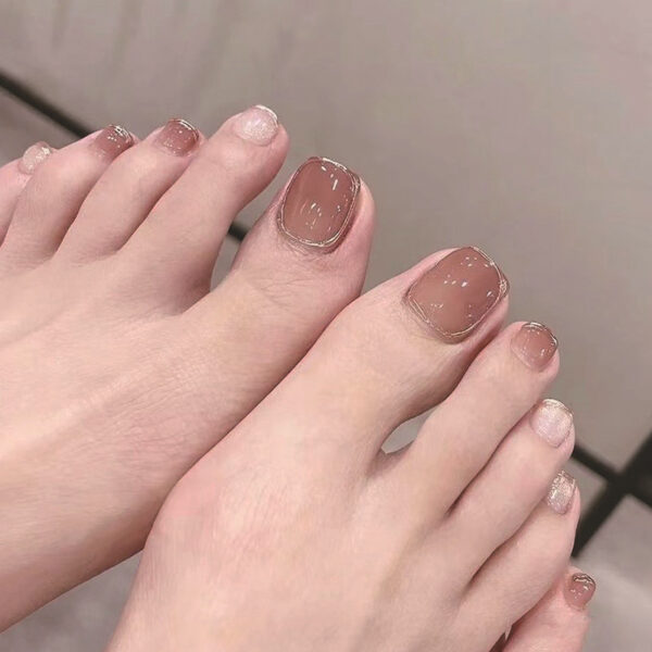Desgaste de uñas al por mayor desnuda borde de oro brillo pie de uñas al por mayor Europa y los Estados Unidos desgaste de uñas de uñas pieza falsa parche de uñas